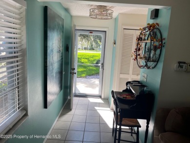 GROUND FLOOR CONDO located on the 8th Fairway of the Heather