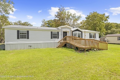 River front living at its best !! Discover this beautifully