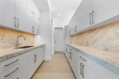 A bold statement of modern luxury, this newly completed