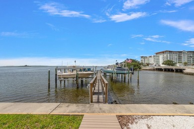 3 BEDROOMS, 2.5 BATHS, LARGE 2 CAR GARAGE AND A BOAT SLIP!