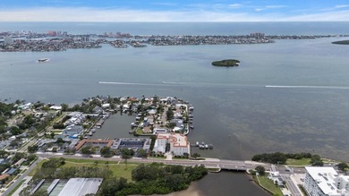 3 BEDROOMS, 2.5 BATHS, LARGE 2 CAR GARAGE AND A BOAT SLIP!