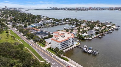 3 BEDROOMS, 2.5 BATHS, LARGE 2 CAR GARAGE AND A BOAT SLIP!