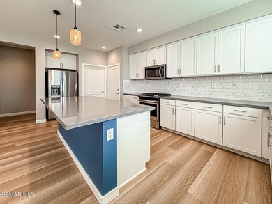 Welcome to The Westerly! This beautifully upgraded end-unit