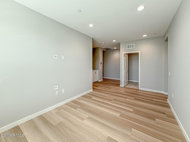 Welcome to The Westerly! This beautifully upgraded end-unit