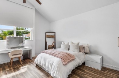 Experience modern elegance in this 4-bedroom, 3-bath condo with