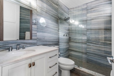 Experience modern elegance in this 4-bedroom, 3-bath condo with