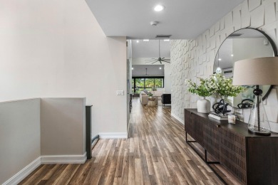 Experience modern elegance in this 4-bedroom, 3-bath condo with