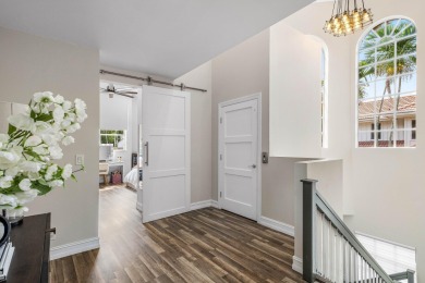 Experience modern elegance in this 4-bedroom, 3-bath condo with