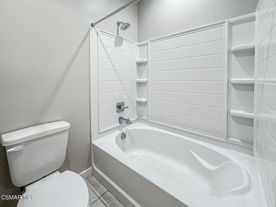 Welcome to The Westerly! This beautifully upgraded end-unit