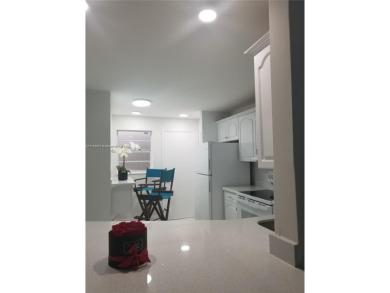 Tastefully remodeled 1/1.5 bath, plus den that can be converted