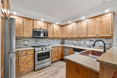 Elegantly remodeled in the last two years, this 3-level, 2,096SF