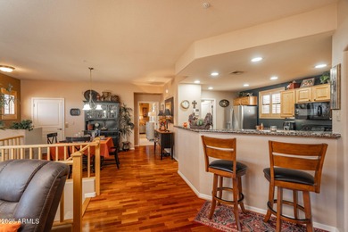 Discover easy luxury living in the gated Hassayampa Village