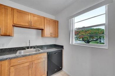 Immaculate, Light, Bright & RENOVATED CORNER; 2 bedrooms 1 1/2