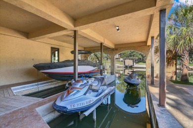252 La Serena Loop is an exceptional waterfront estate in the