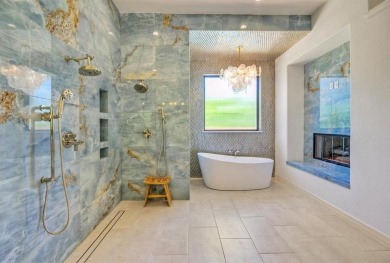 Set on a rare double lot overlooking the scenic Avery Ranch Golf