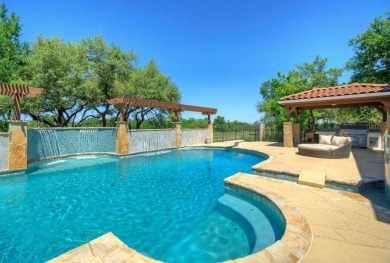 Set on a rare double lot overlooking the scenic Avery Ranch Golf