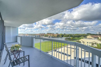 A Rare Gem in Old Port Cove Stunning Waterfront Living! Be the