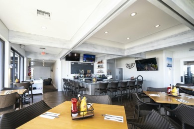 A Rare Gem in Old Port Cove Stunning Waterfront Living! Be the