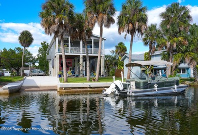 PRICE IMPROVEMENT !!! WELCOME HOME to this exquisite Waterfront