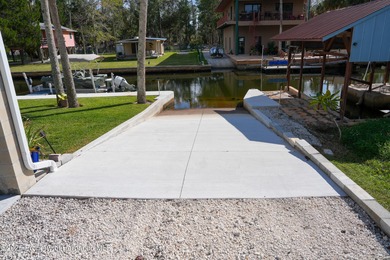 PRICE IMPROVEMENT !!! WELCOME HOME to this exquisite Waterfront