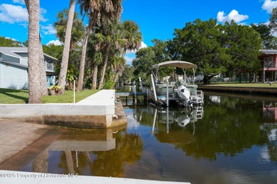 PRICE IMPROVEMENT !!! WELCOME HOME to this exquisite Waterfront