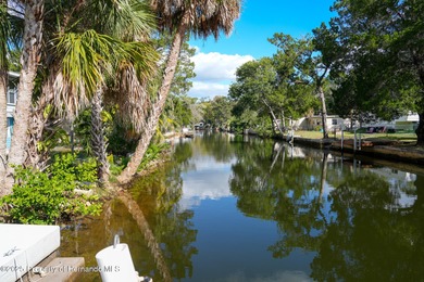 PRICE IMPROVEMENT !!! WELCOME HOME to this exquisite Waterfront