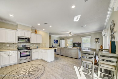 PRICE IMPROVEMENT !!! WELCOME HOME to this exquisite Waterfront