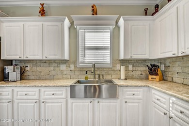 PRICE IMPROVEMENT !!! WELCOME HOME to this exquisite Waterfront