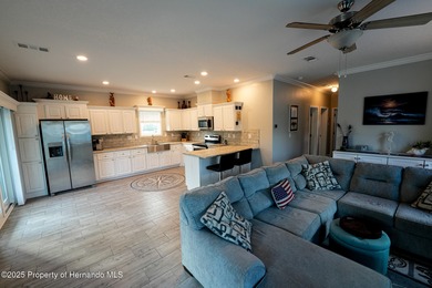 PRICE IMPROVEMENT !!! WELCOME HOME to this exquisite Waterfront