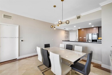 Live above it all at The Lexi! This stunning 2 bed + den / 2