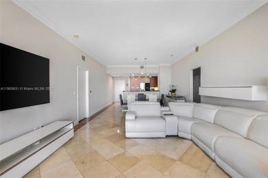 Live above it all at The Lexi! This stunning 2 bed + den / 2