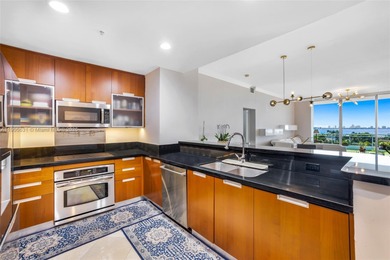 Live above it all at The Lexi! This stunning 2 bed + den / 2