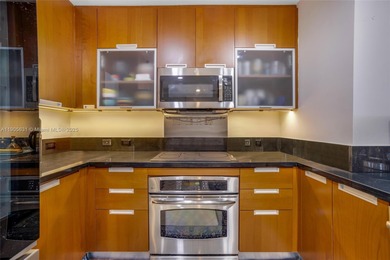 Live above it all at The Lexi! This stunning 2 bed + den / 2