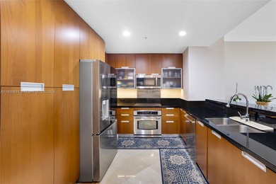 Live above it all at The Lexi! This stunning 2 bed + den / 2