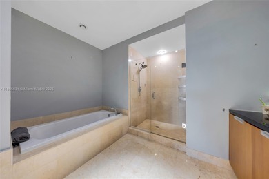 Live above it all at The Lexi! This stunning 2 bed + den / 2