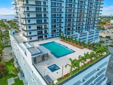 Live above it all at The Lexi! This stunning 2 bed + den / 2