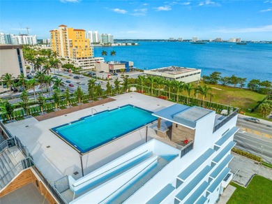 Live above it all at The Lexi! This stunning 2 bed + den / 2