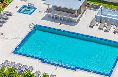 Live above it all at The Lexi! This stunning 2 bed + den / 2