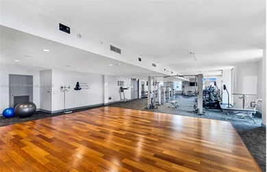 Live above it all at The Lexi! This stunning 2 bed + den / 2