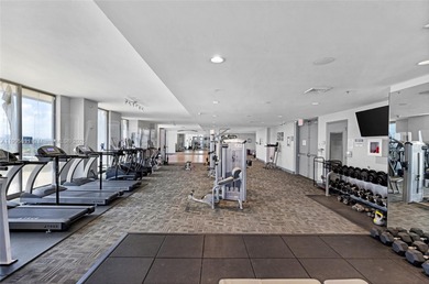 Live above it all at The Lexi! This stunning 2 bed + den / 2