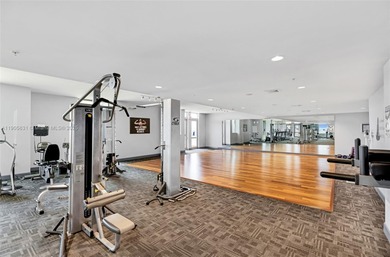 Live above it all at The Lexi! This stunning 2 bed + den / 2