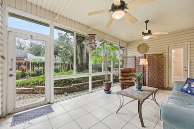 Nestled beneath a canopy of Mandarin oak trees, this