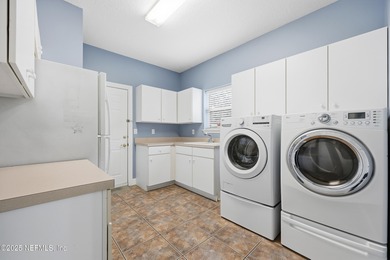 Nestled beneath a canopy of Mandarin oak trees, this