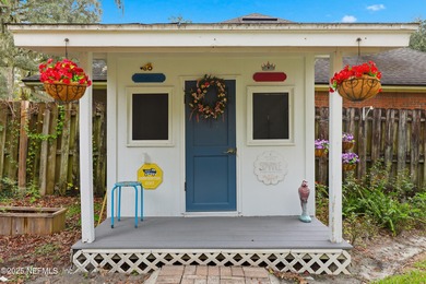 Nestled beneath a canopy of Mandarin oak trees, this