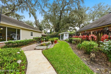 Nestled beneath a canopy of Mandarin oak trees, this