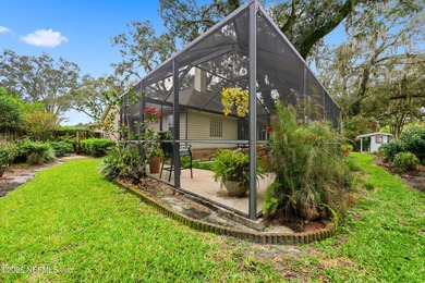 Nestled beneath a canopy of Mandarin oak trees, this