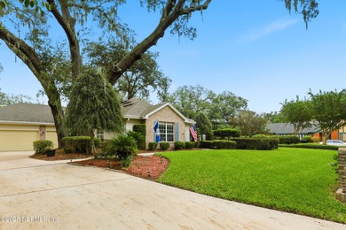 Nestled beneath a canopy of Mandarin oak trees, this