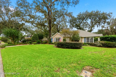 Nestled beneath a canopy of Mandarin oak trees, this