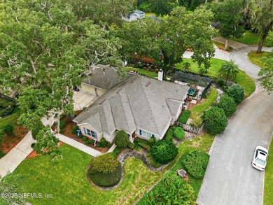 Nestled beneath a canopy of Mandarin oak trees, this