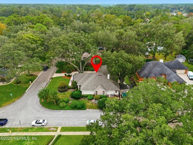 Nestled beneath a canopy of Mandarin oak trees, this